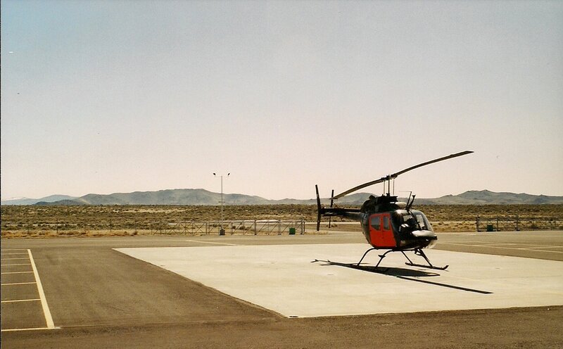 Helicopter on Tarmac — Gray, Desolate