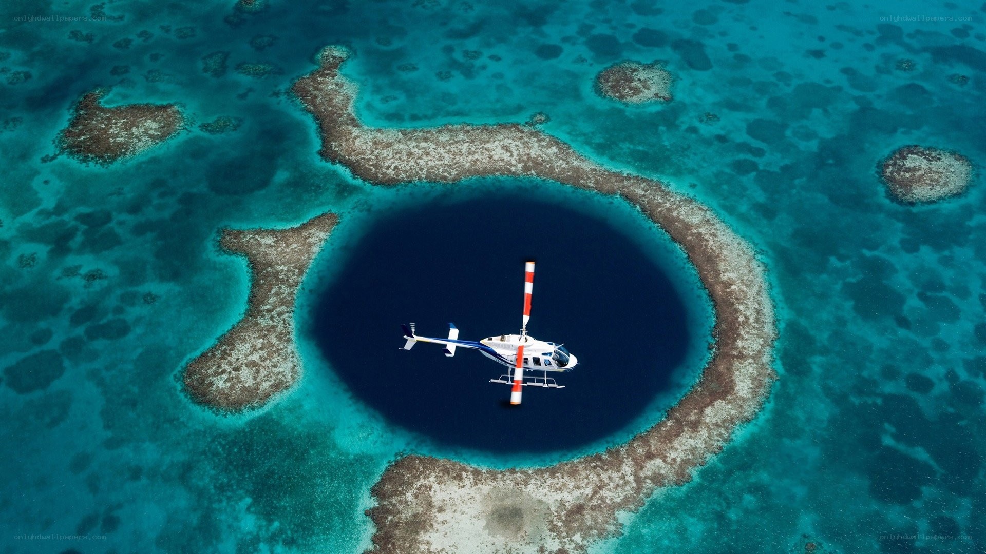 helicopter over blue hole