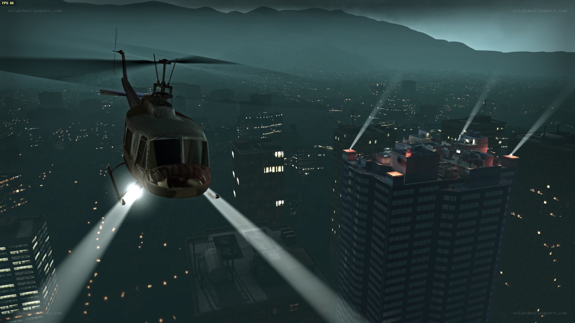 helicopter over city at night