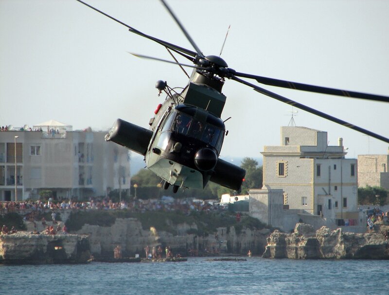 Helicopter over coastal town