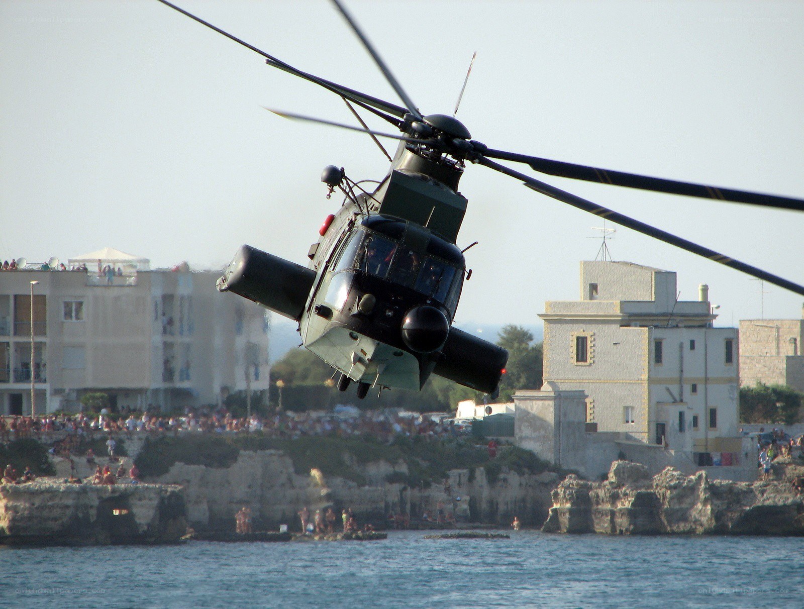 Helicopter over coastal town