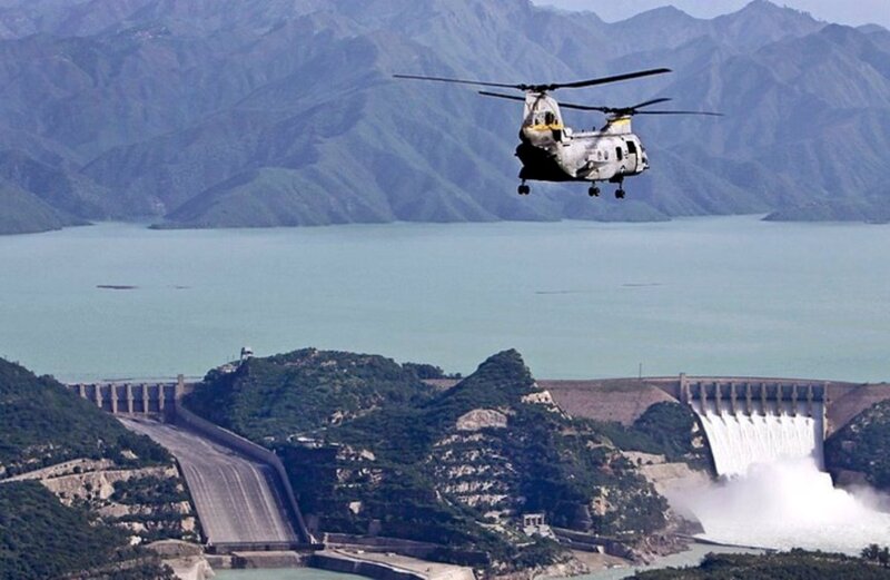 Helicopter over Dam — Green