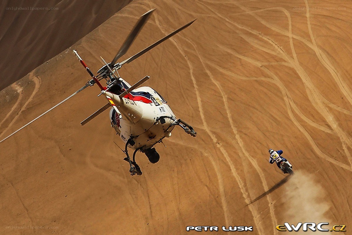 Helicopter over desert racer