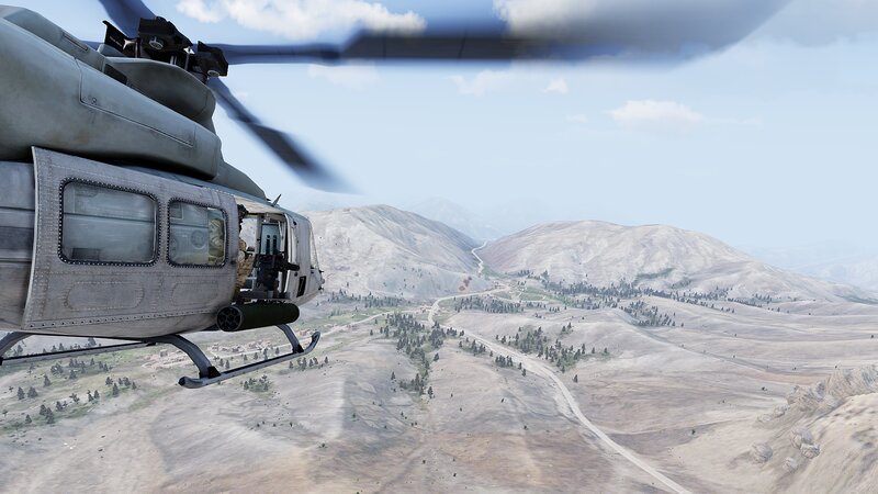 Helicopter over Desert Terrain