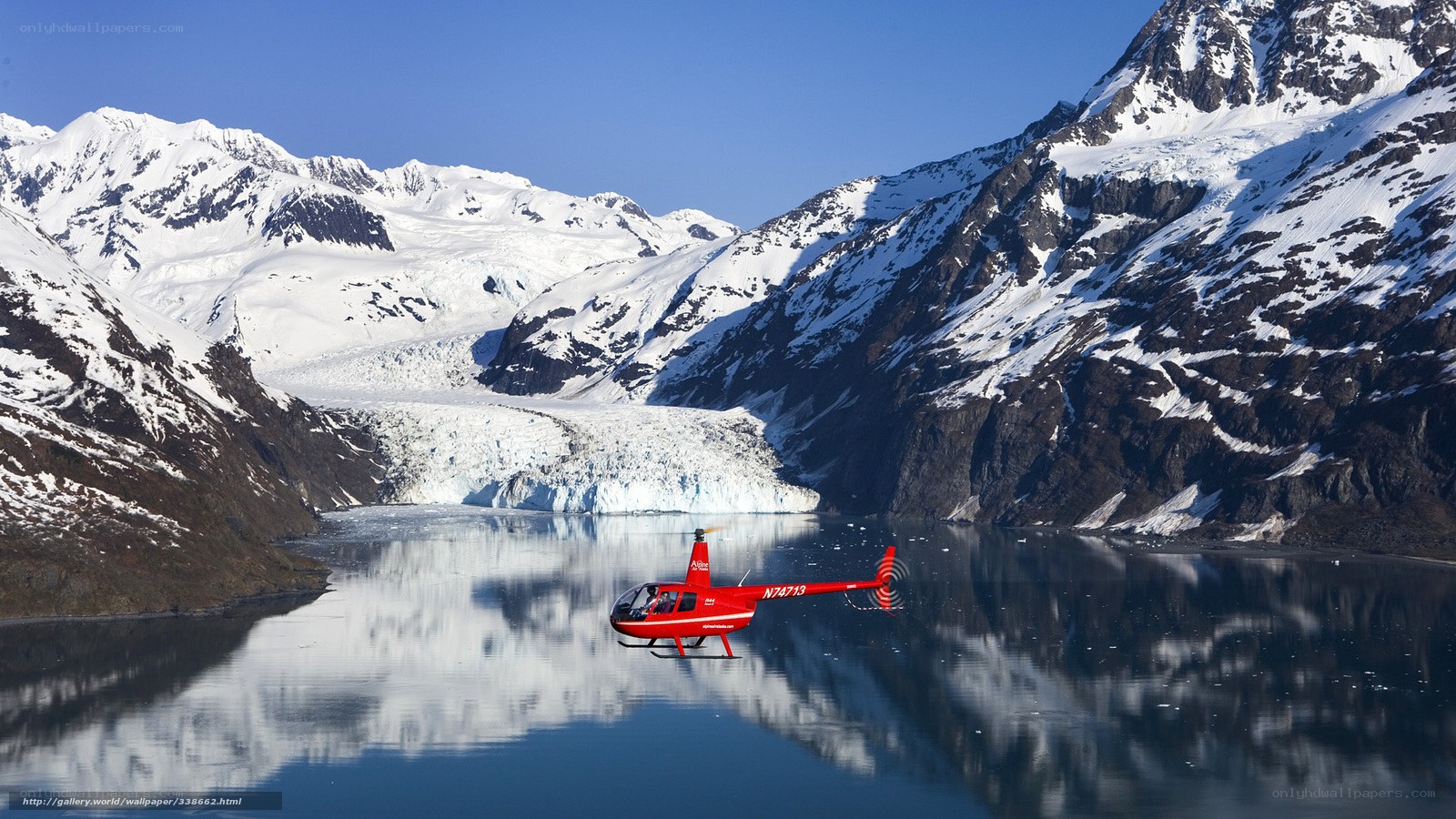 Helicopter over glacier lake