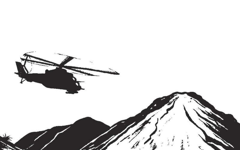 Helicopter over mountain silhouette