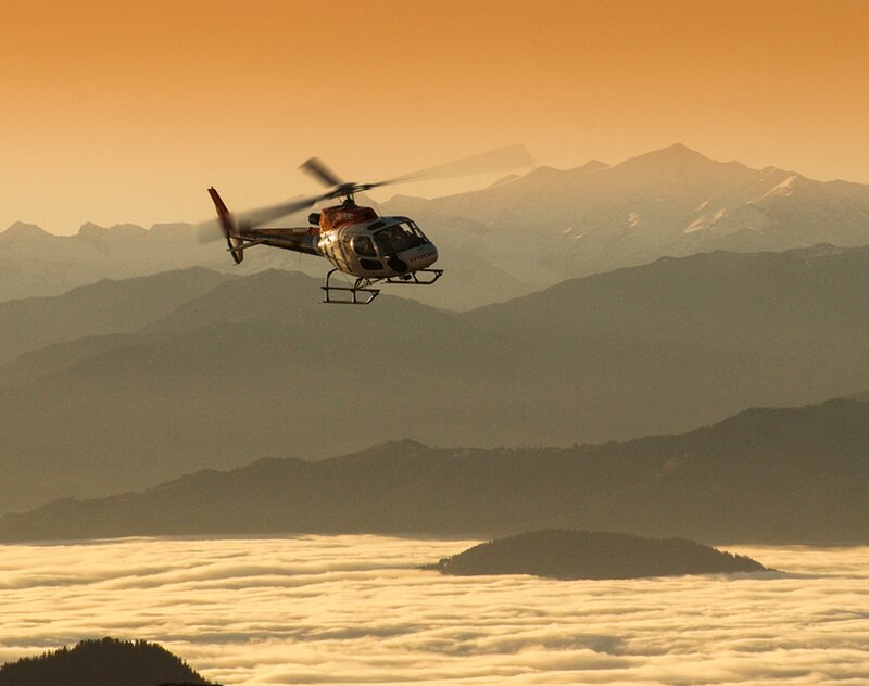 Helicopter over Mountains — Orange