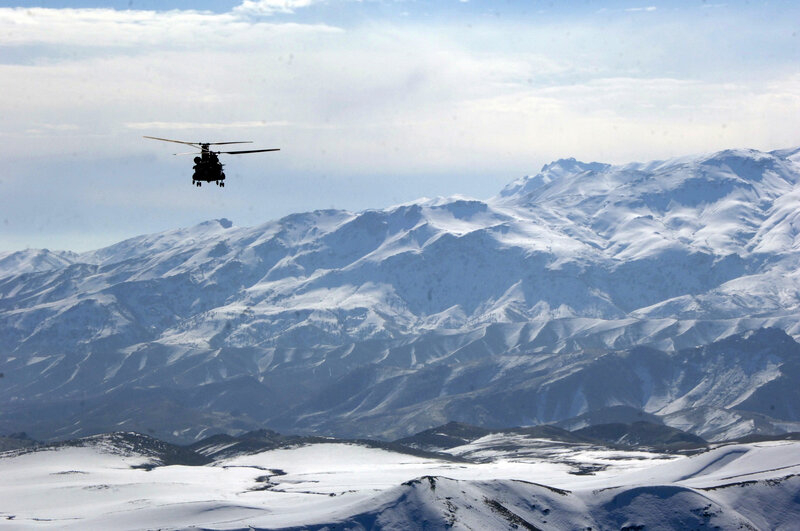 Helicopter over Mountains — White