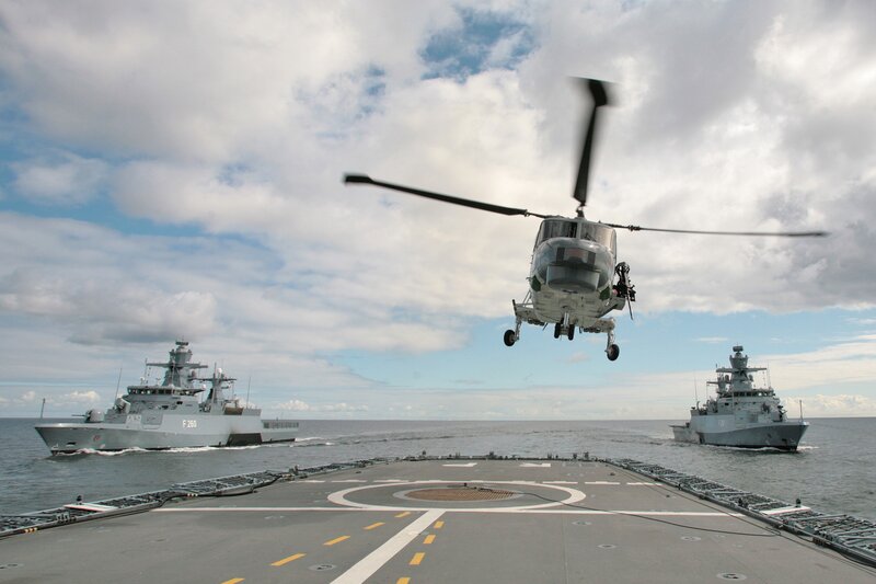Helicopter over Naval Ships