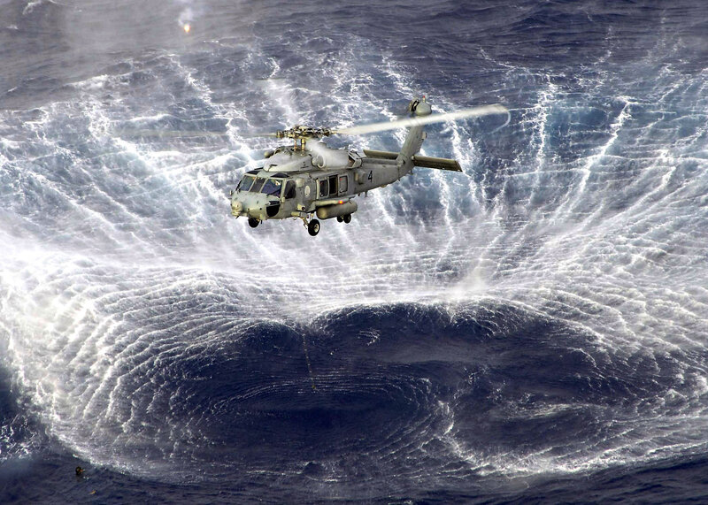 Helicopter over ocean vortex