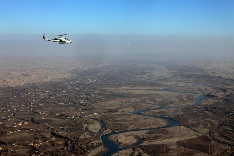Helicopter over river valley