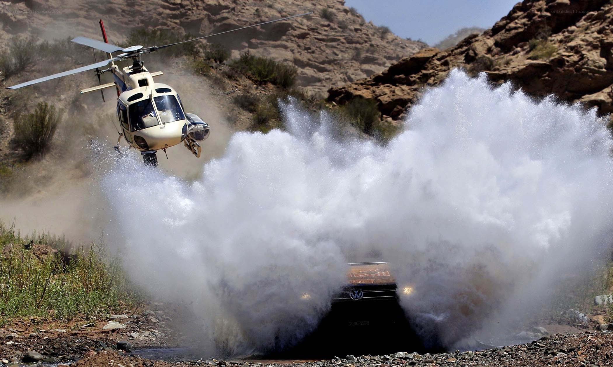 Helicopter over splashing car