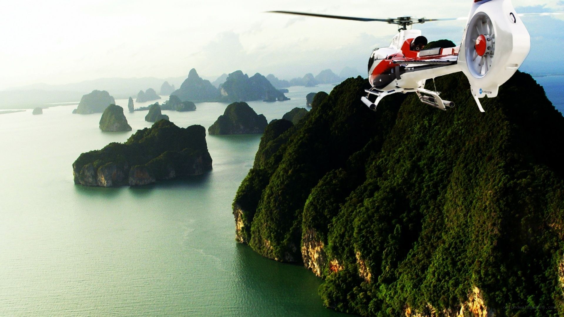 helicopter over tropical islands