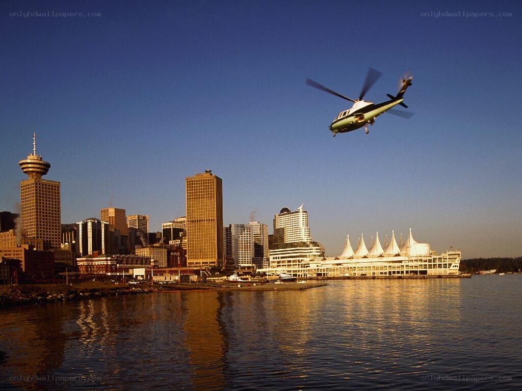 Helicopter over Vancouver skyline