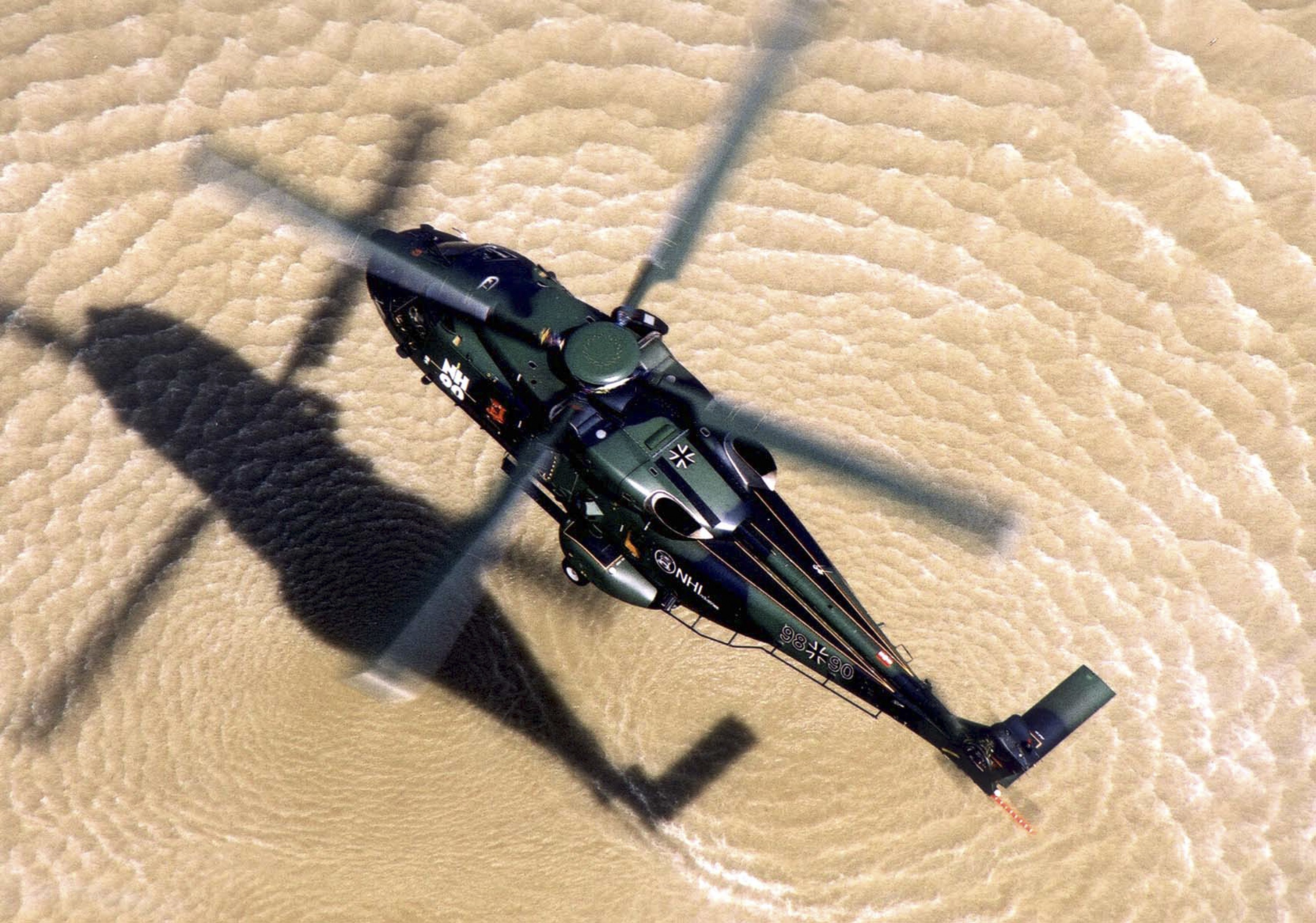 Helicopter over water surface
