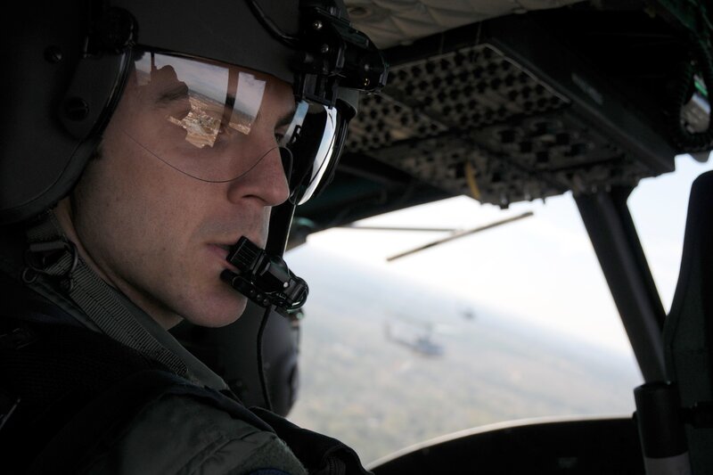 Helicopter pilot in cockpit