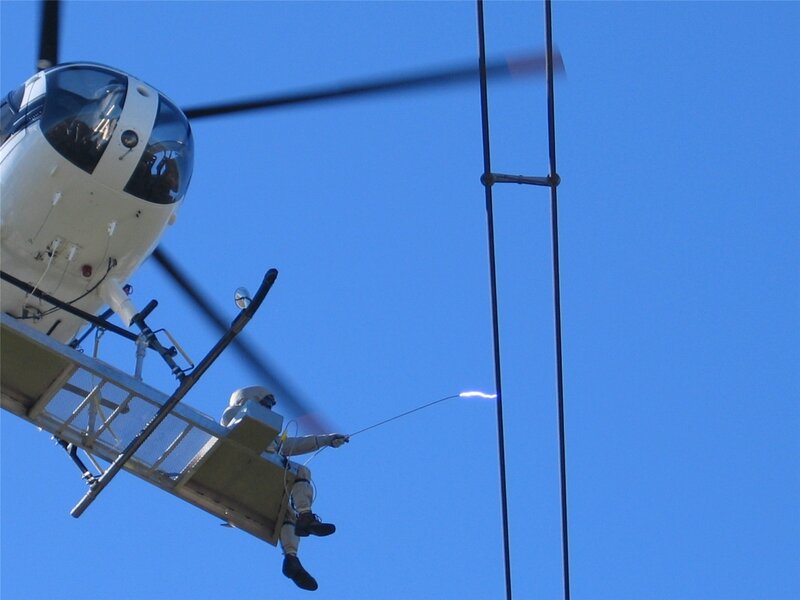 Helicopter power line maintenance
