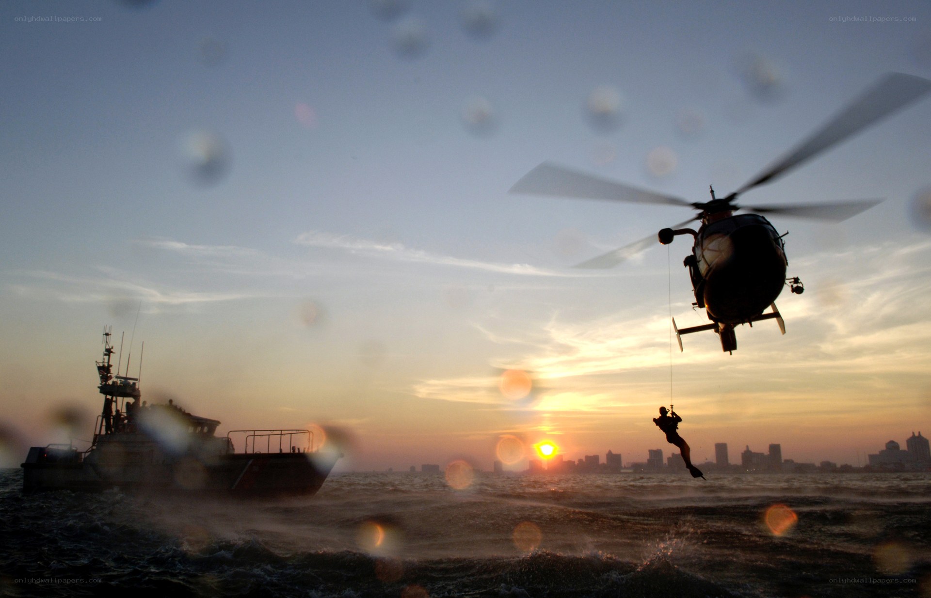Helicopter rescue at sunset