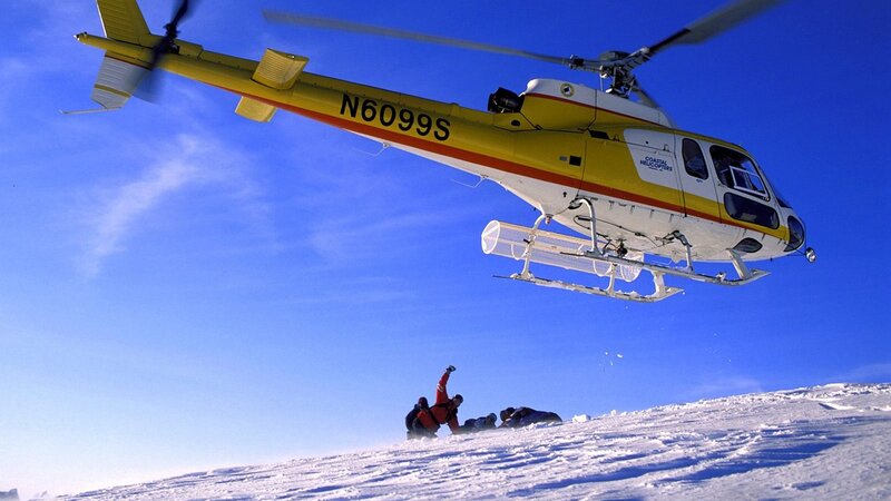 Helicopter rescue in snowy terrain