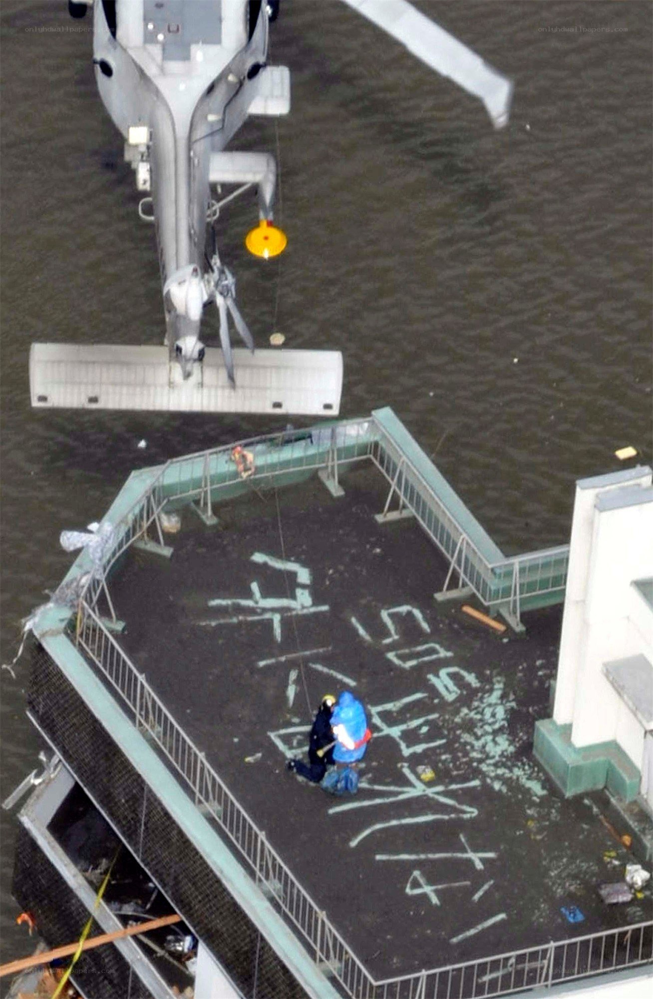 Helicopter rescue on rooftop