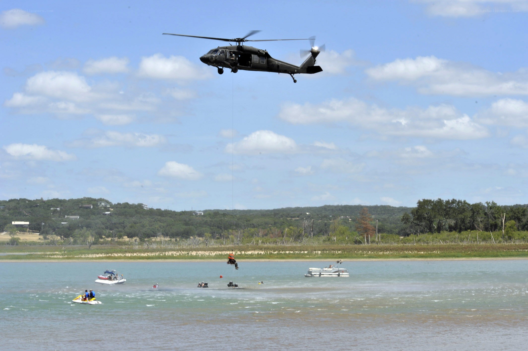Helicopter rescue over lake