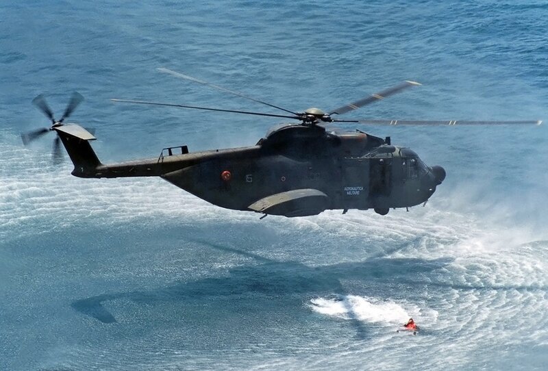 Helicopter Rescuing Person — Blue, Dramatic