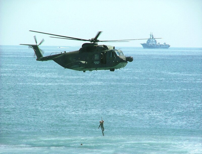 Helicopter Rescuing Person — Blue