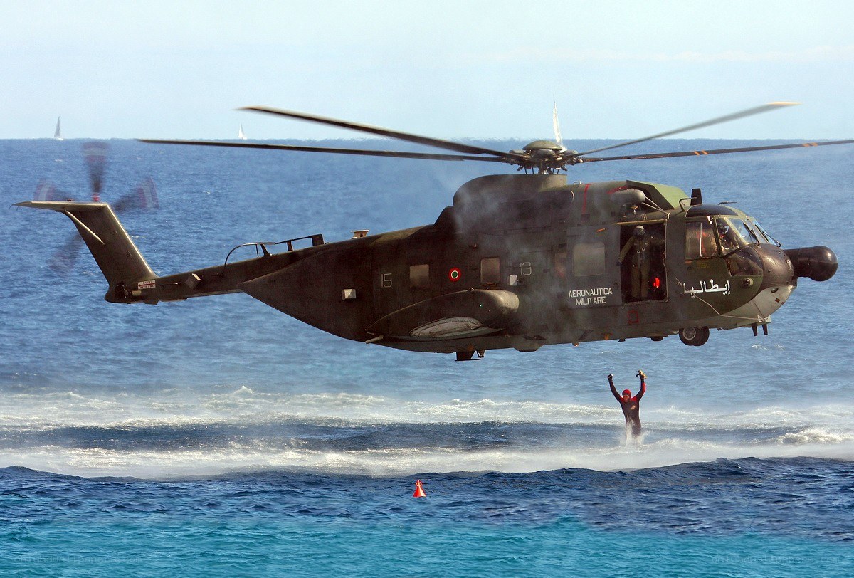 Helicopter rescuing swimmer