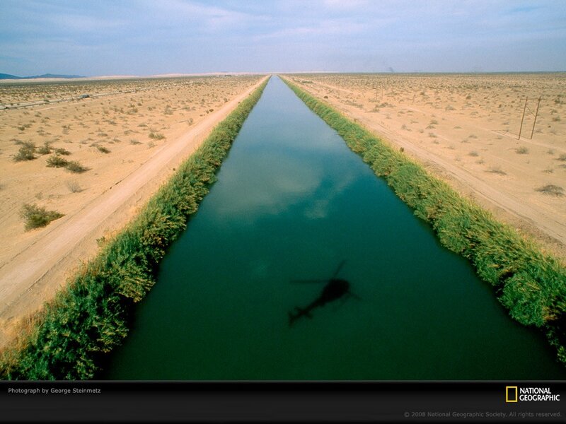 Helicopter shadow on canal