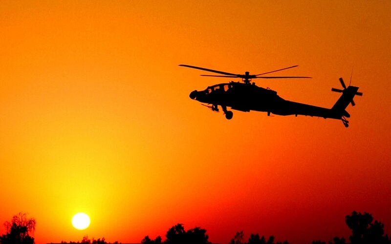 helicopter silhouette at sunset