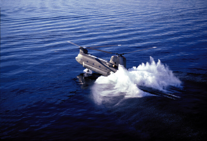 Helicopter skimming ocean surface