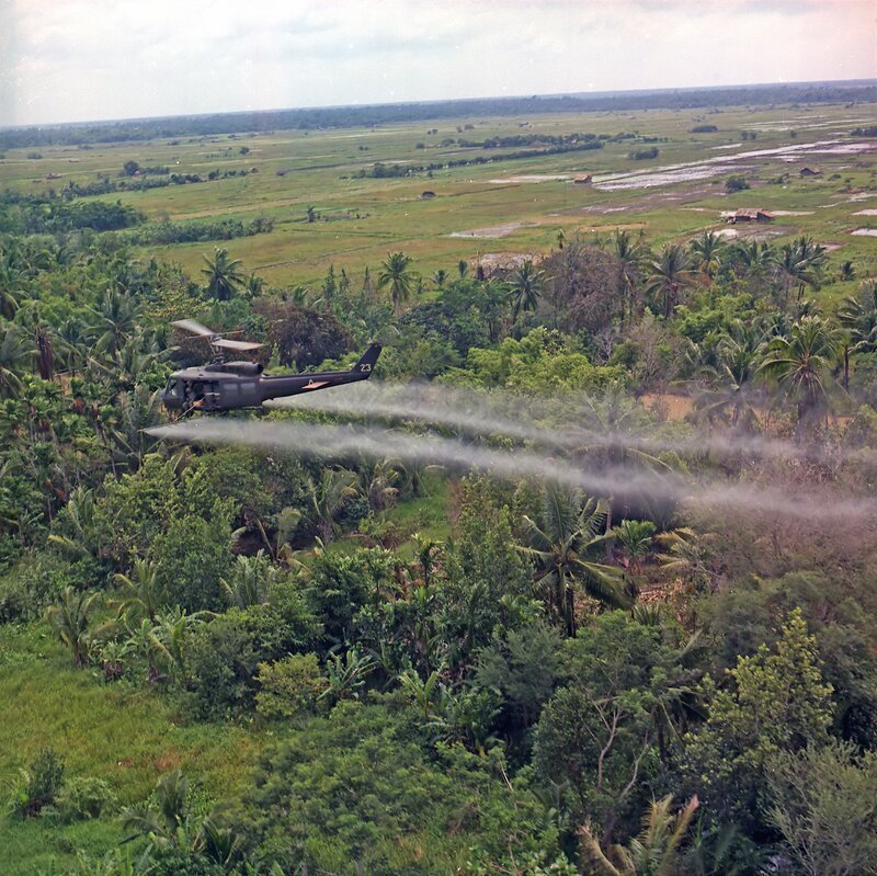 Helicopter spraying pesticide