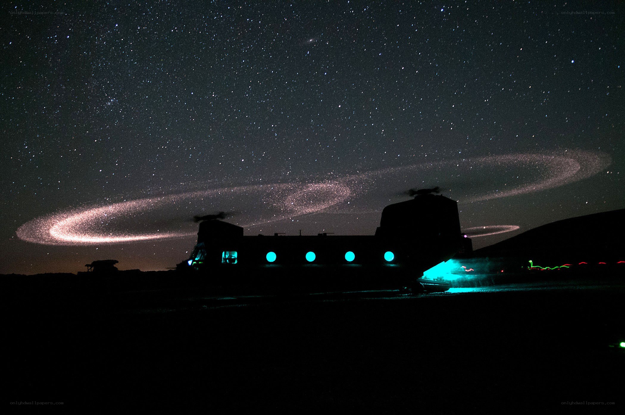 Helicopter under starry sky