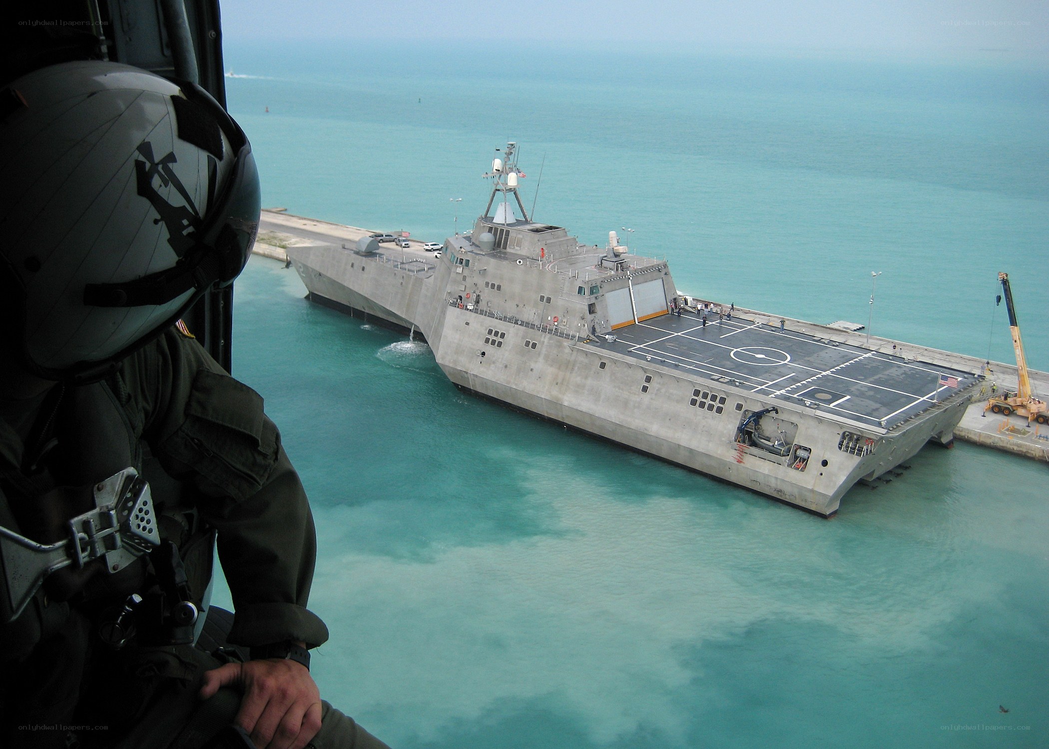 Helicopter view of naval ship