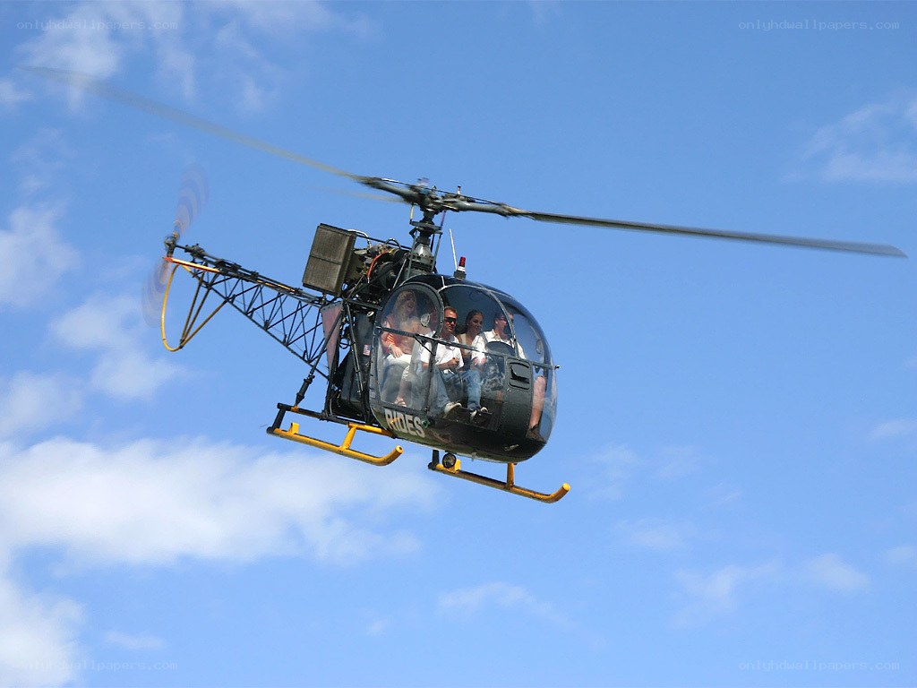 Helicopter with passengers in flight