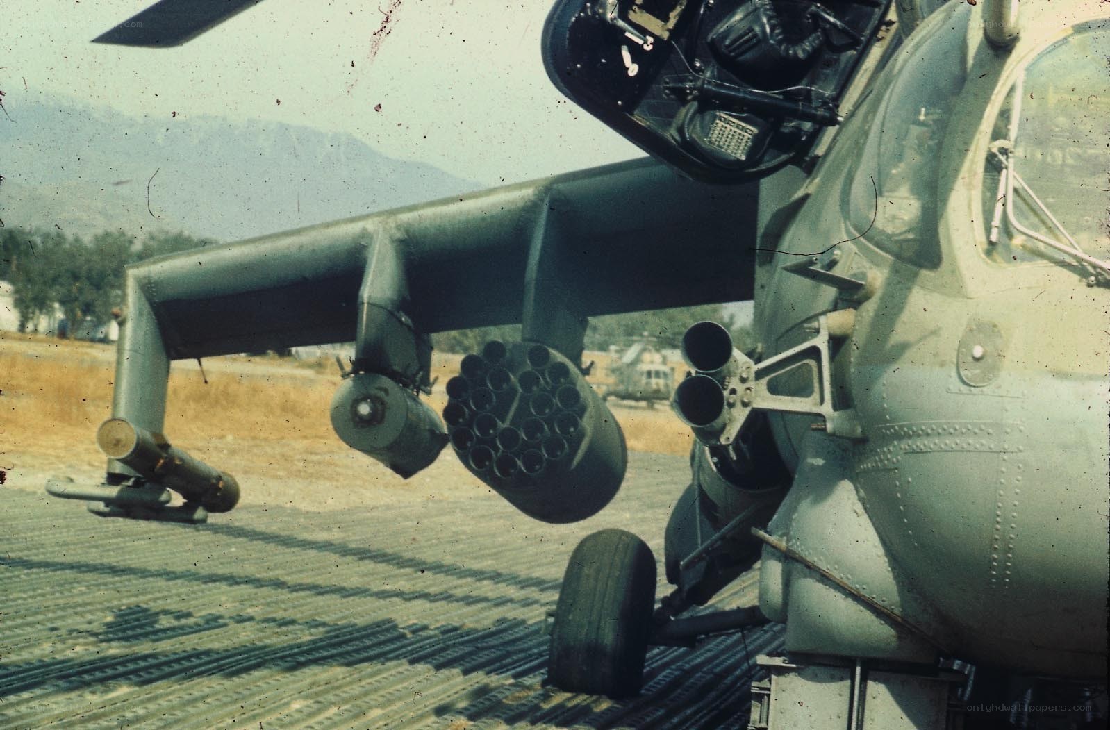 Helicopter with rocket pods