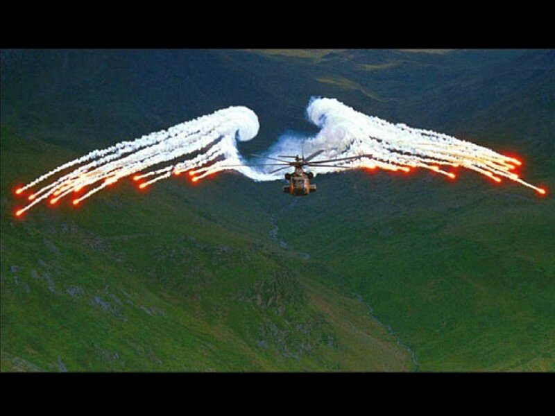 helicopter with smoke trails