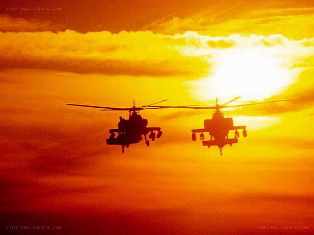 Helicopters at sunset
