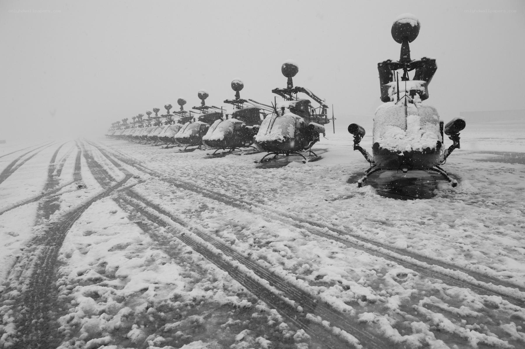 Helicopters in a snowstorm