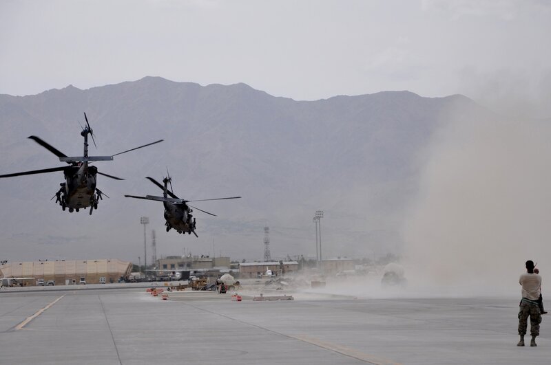 Helicopters landing at airfield