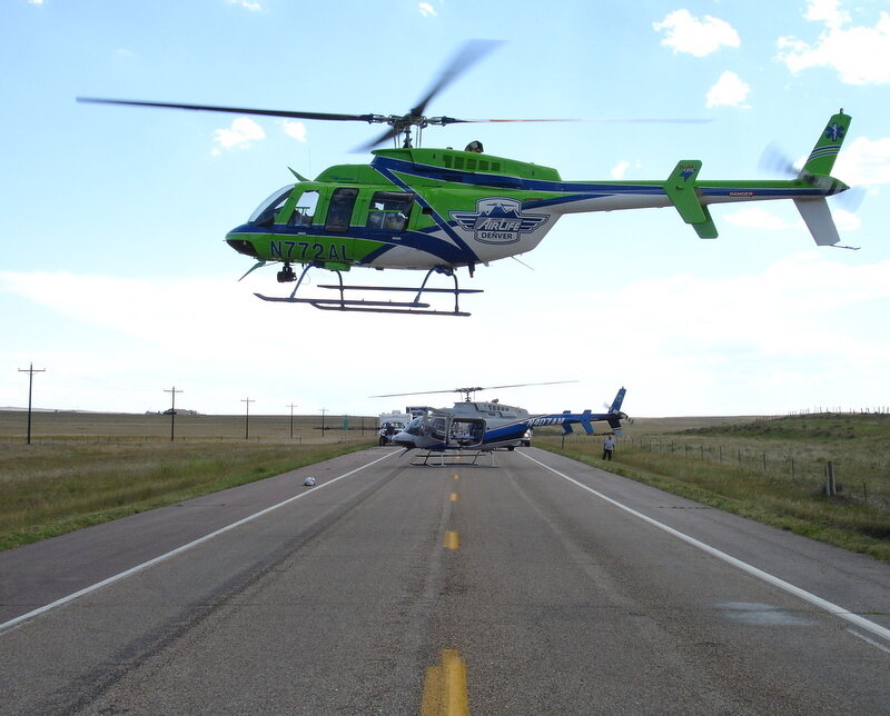 Helicopters on a road