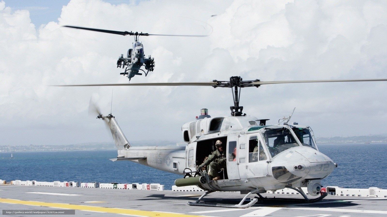Helicopters on aircraft carrier deck