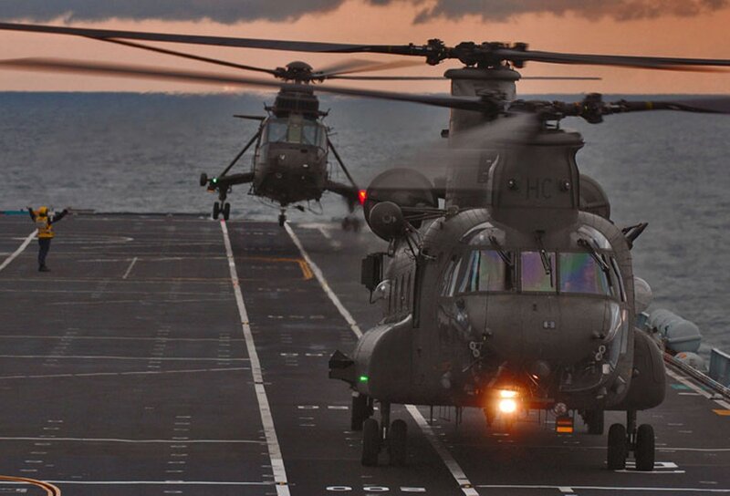 Helicopters on aircraft carrier deck