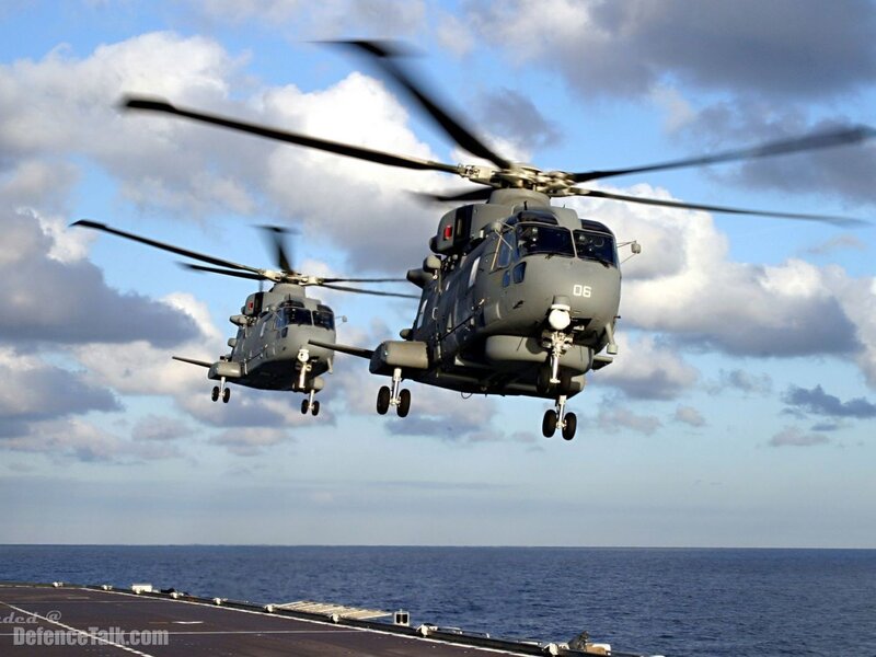 Helicopters over aircraft carrier