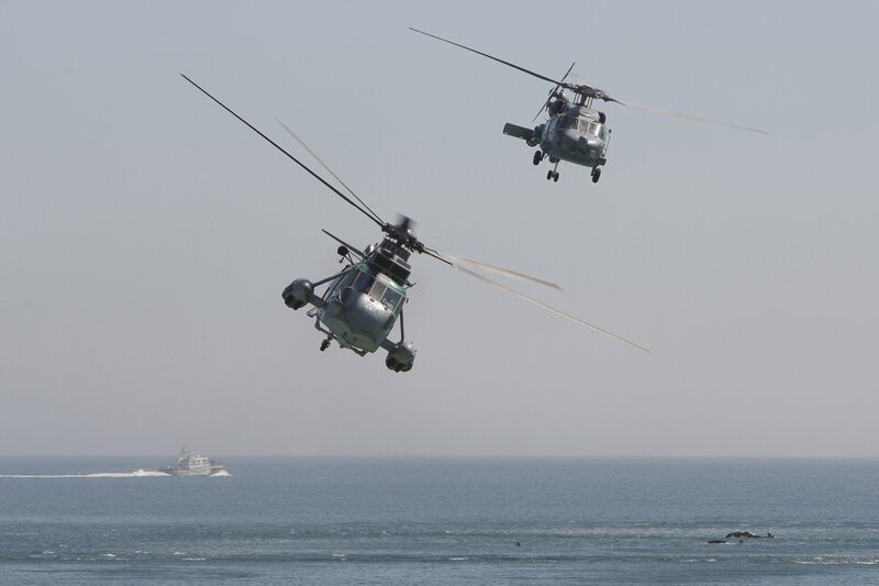 Helicopters over the ocean