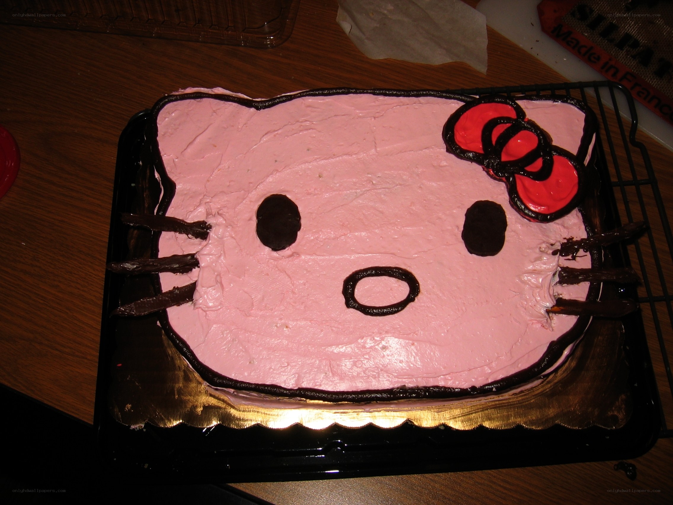 Hello Kitty cake on table