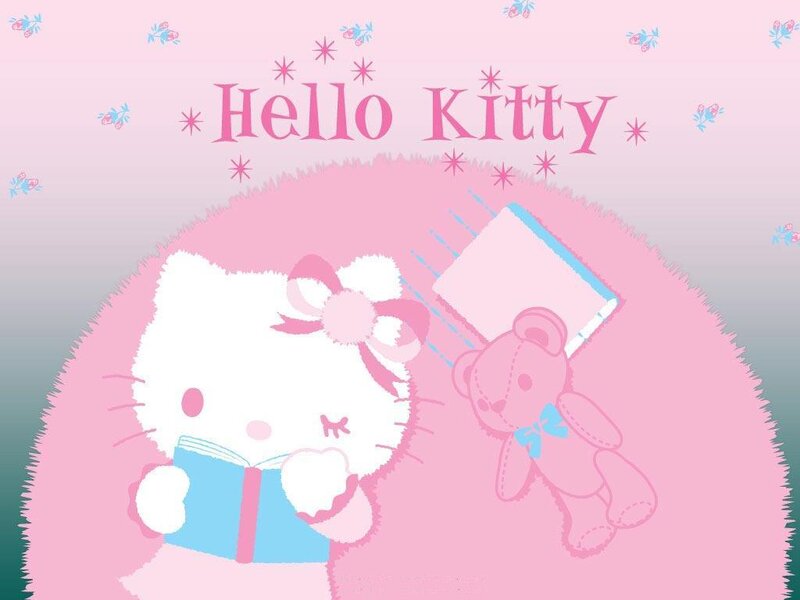 Hello Kitty reading a book