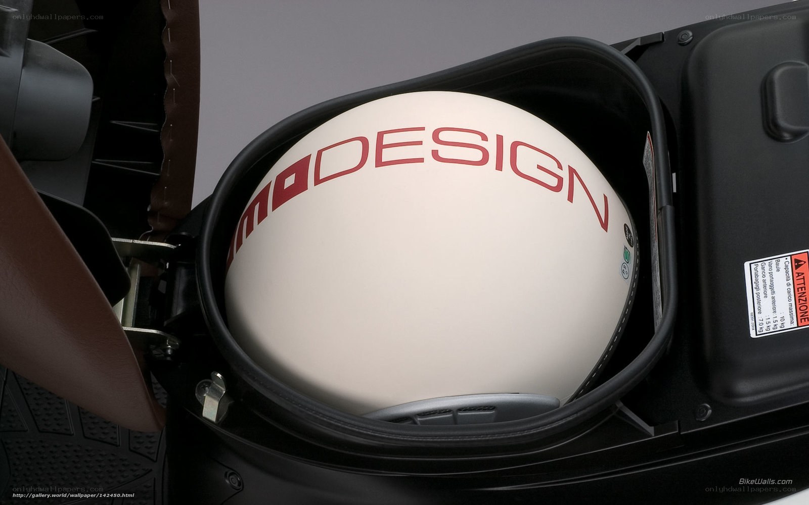 Helmet in scooter storage