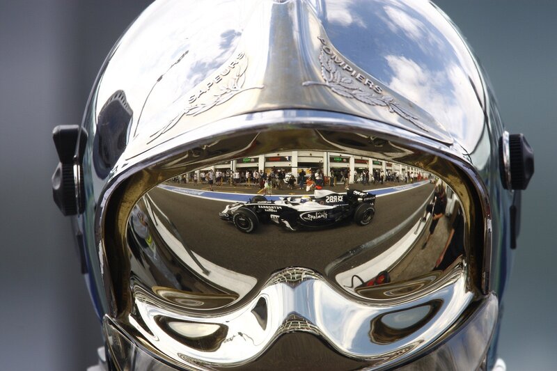 Helmet reflection of race car