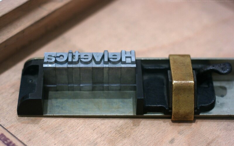 Helvetica letterpress type in a chase